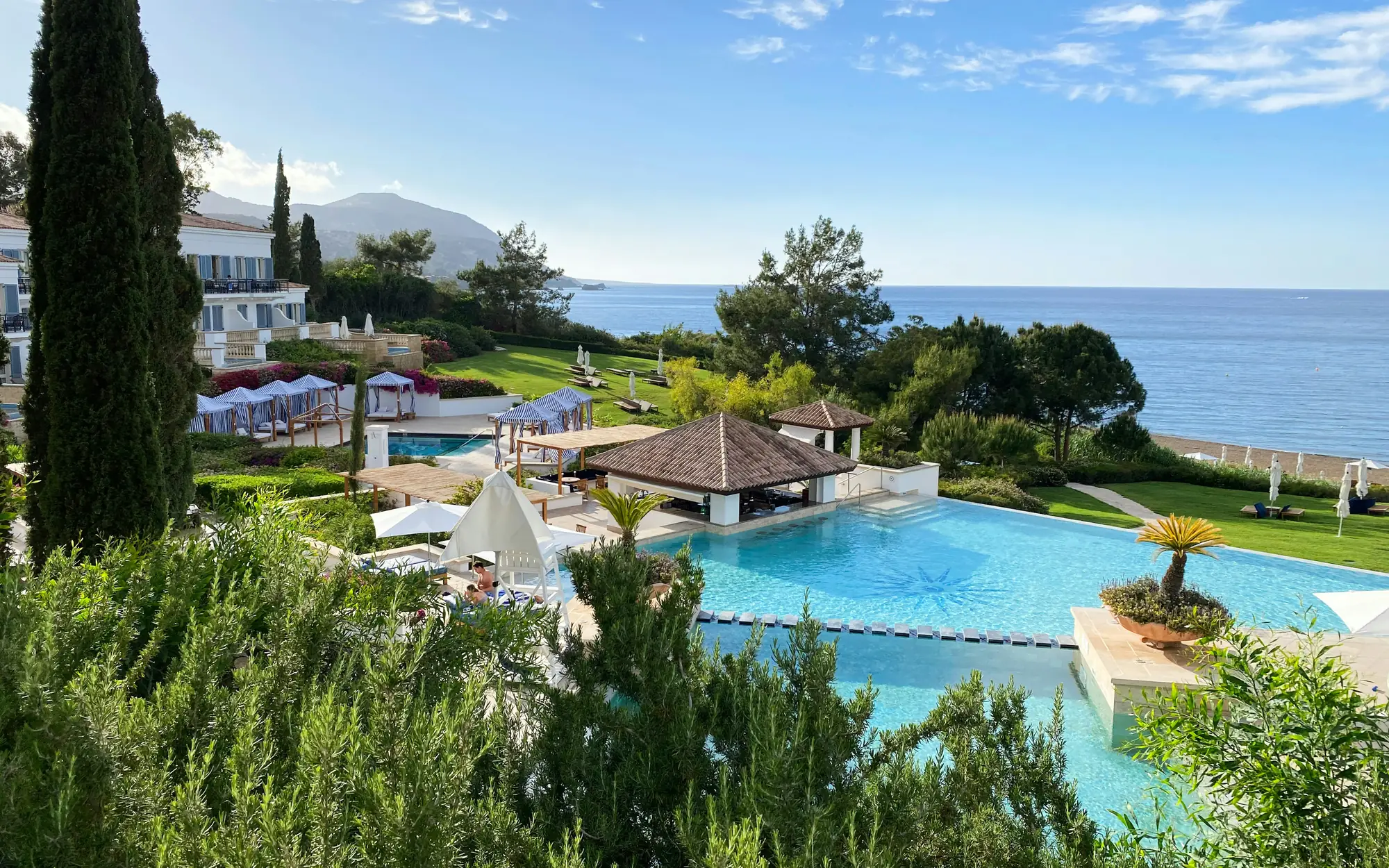 Coastal resort garden with a pool above the Mediterranean sea in Cyprus