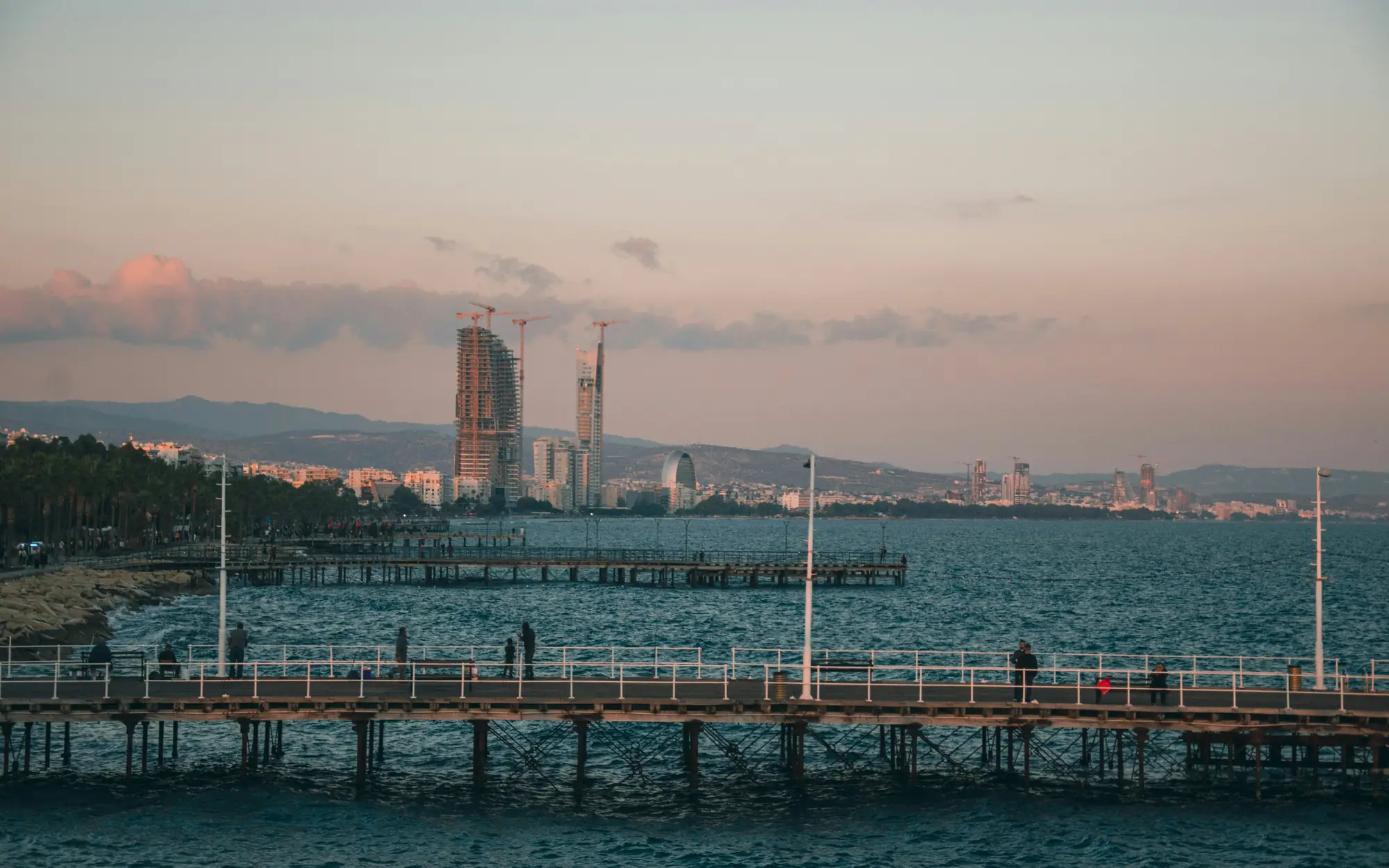 Limassol skyline and seafront pier at sunset