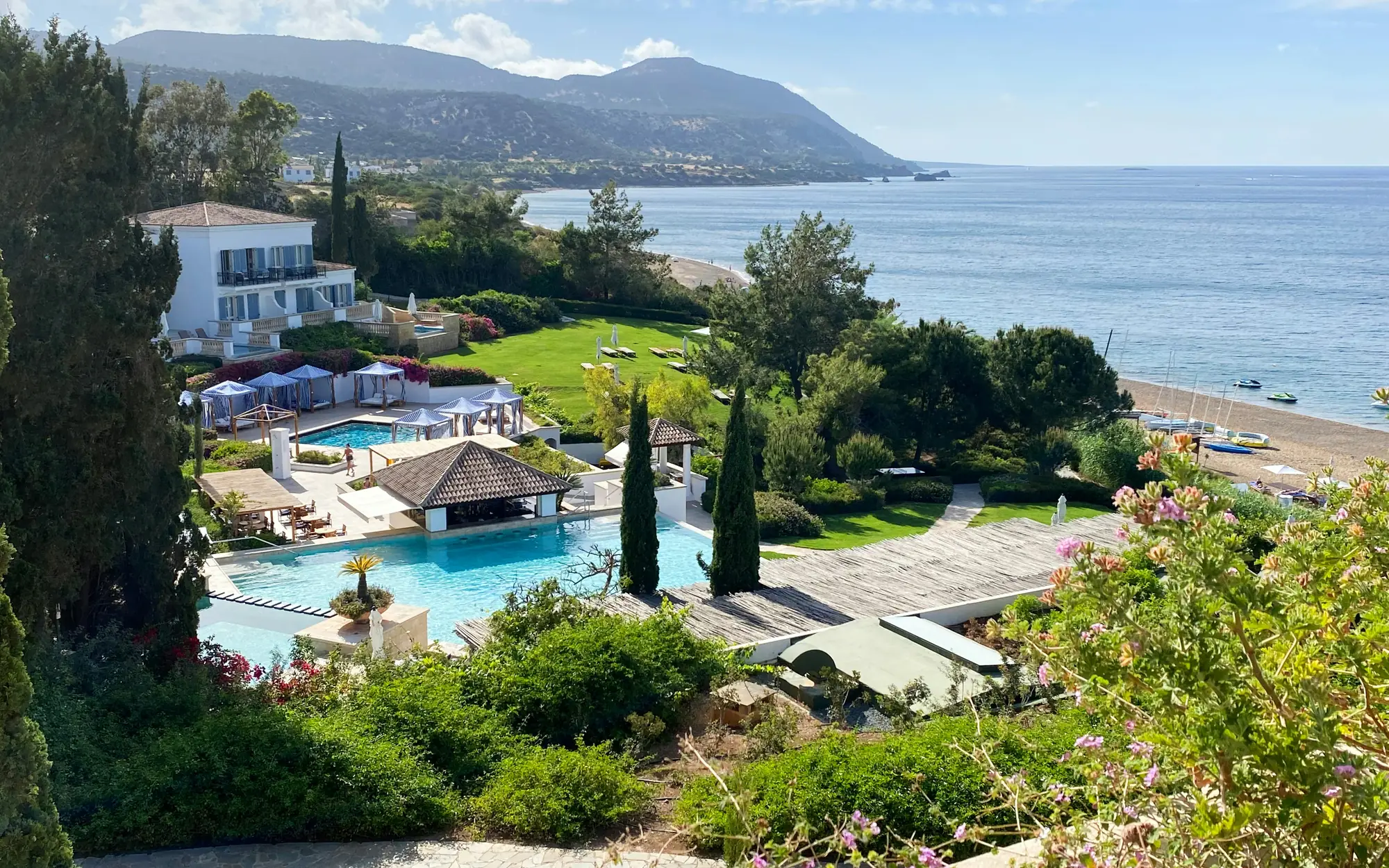 Seaside resort with gardens, a pool and the coastline in Cyprus